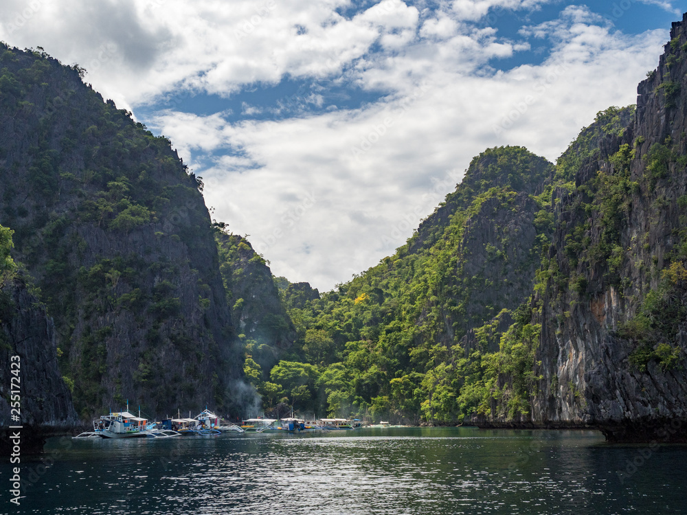 Amazing Barracuda lake on Coron Island, surrounded by limestone cliffs, is a popular tourist attraction and diving spot at the Philippines. November, 2018