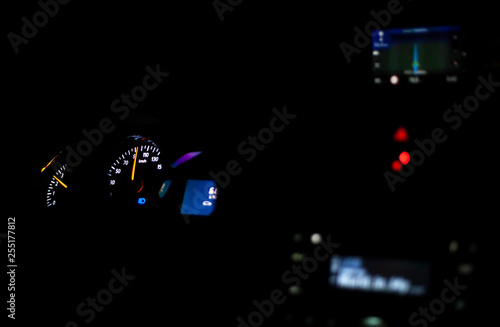 dark background view car dashboard lights up in the dark