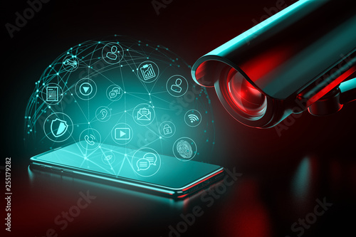 Fotografie Big CCTV focusing on a smartphone and icons hovering above it as a metaphor of data surveillance and ways to protect it