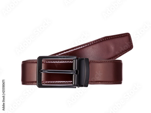 fastened fashionable men's brown leather belt with dark matted metal buckle isolated on white