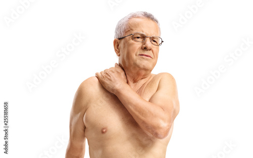 Elderly man holding his painful neck