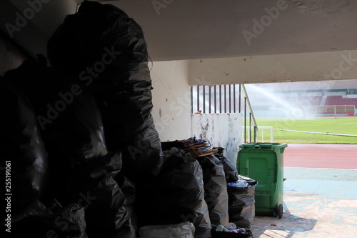 Garbage dump at stadium after football games.