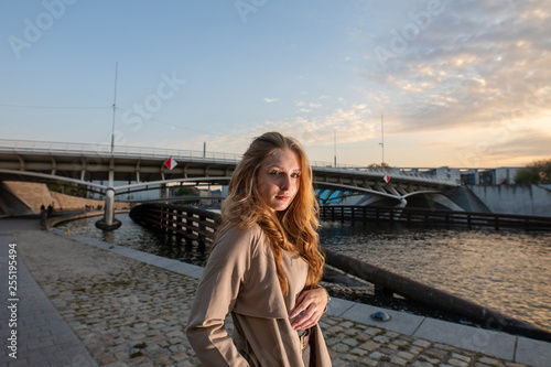 young woman in nice dress around berlin 