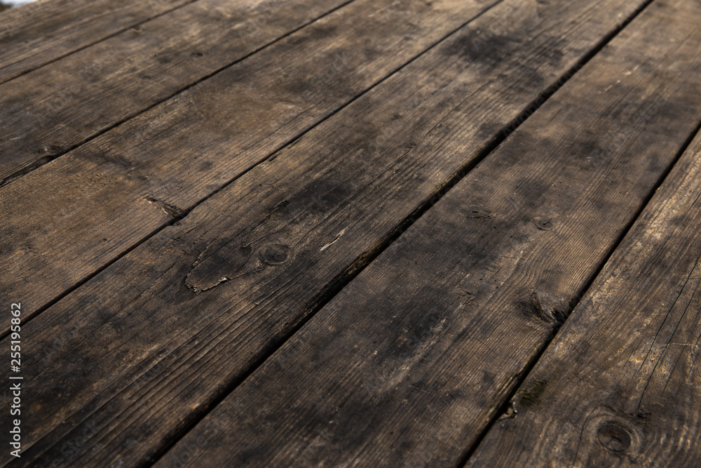 Empty wooden table with snow bokeh for a catering or food picnic texture Empty wooden table with snow bokeh for a catering or food picnic texture