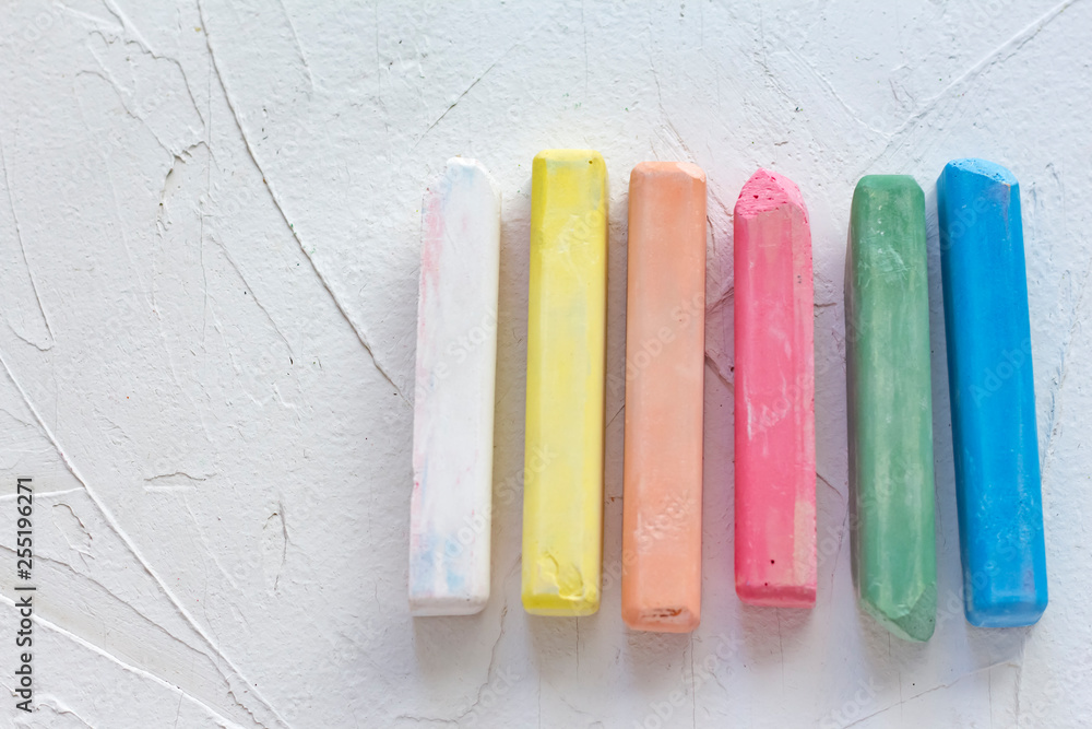 colored crayons on white background with copy space colored crayons on white background with copy space
