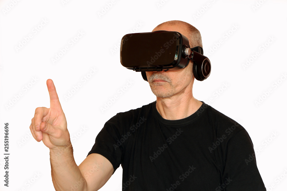 Close-up of a man in a black T-shirt with glasses of virtual reality. Close-up of a man in a black T-shirt with glasses of virtual reality.