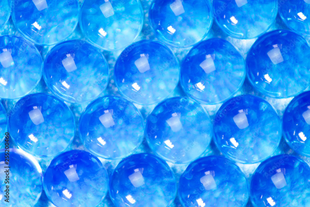 sparkles translucent through blue hydrogel