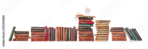 Old books row isolated on white with clipping path