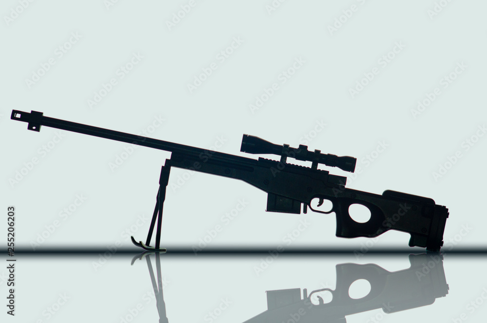 military weapons. toy on a plain background military weapons. toy on a plain background