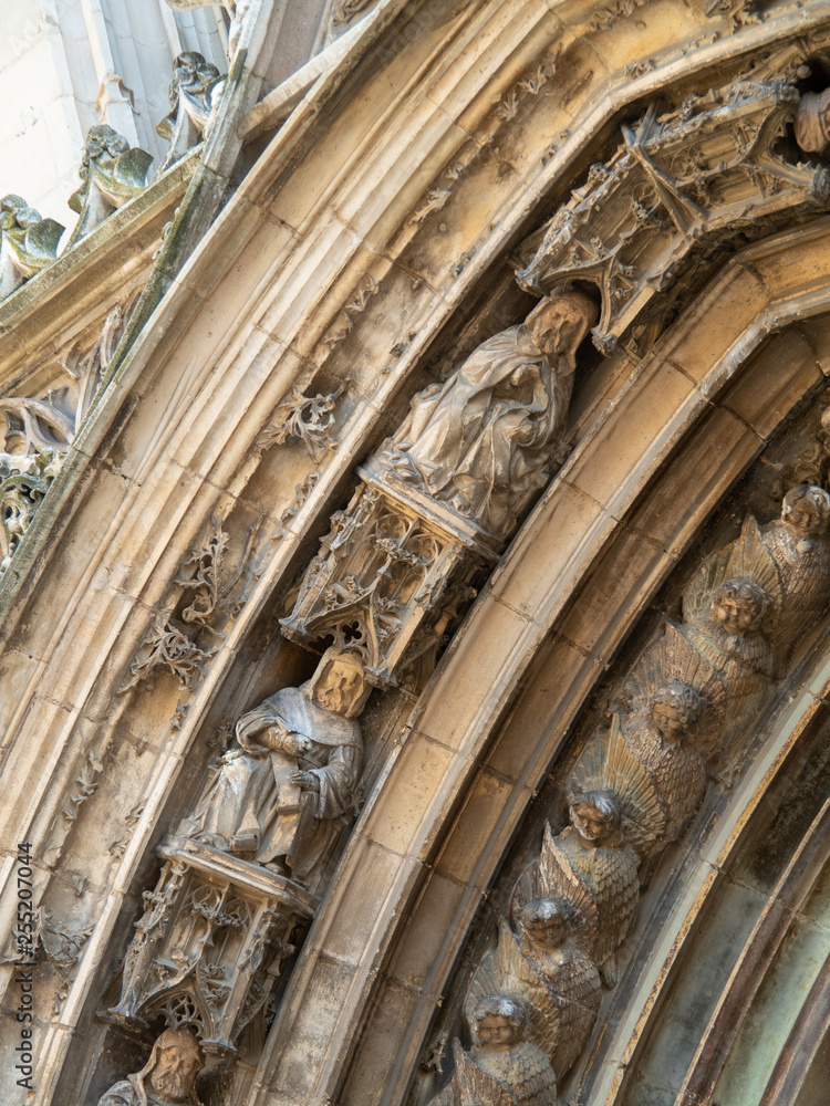 Close up of statue decorated at entrance of Aix Cathedral (Cathédrale Saint-Sauveur d'Aix-en-Provence) in Aix-en-Provence. Aix Cathedral was Built and re-built from the 12th until the 19th century.