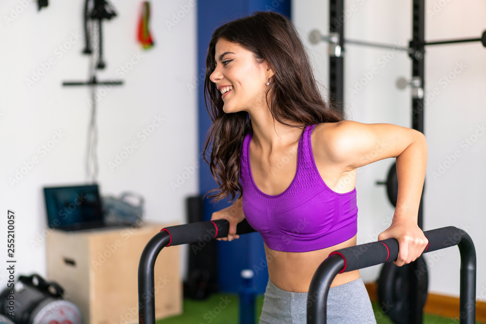 Young sport woman in a gym