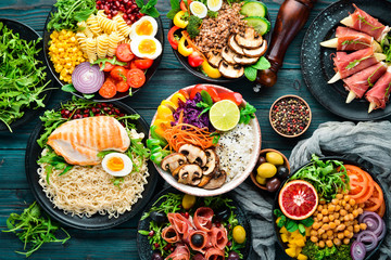 Assortment of healthy food dishes. Top view. Free space for your text.