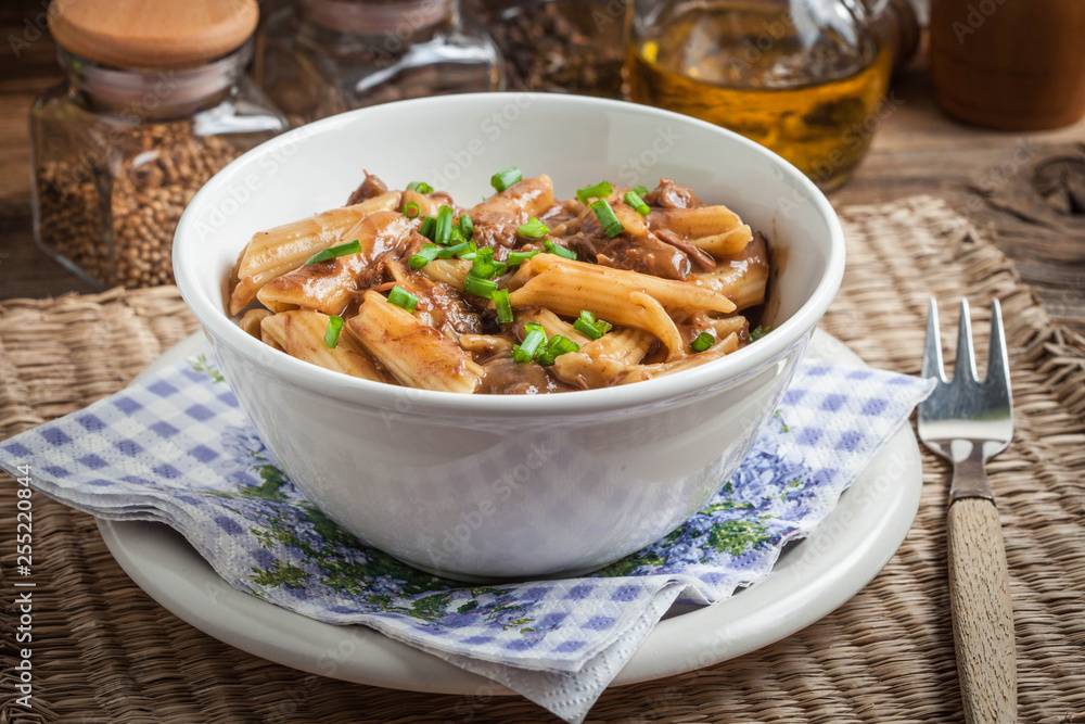 Pasta penne with pork sauce. Pasta penne with pork sauce.