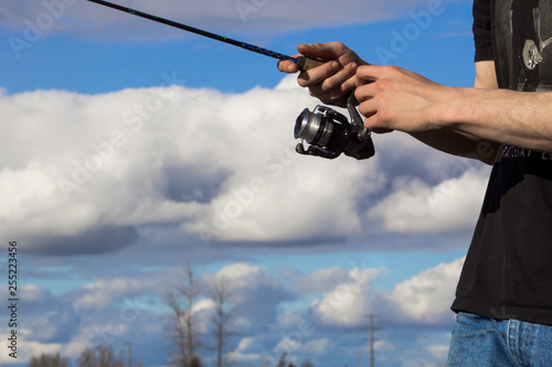 fisherman with fishing rod © lauren