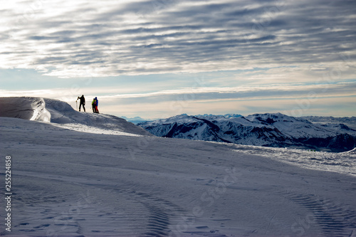 Skiers on high mountain