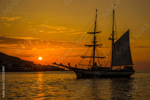 old sailing ship at sunset