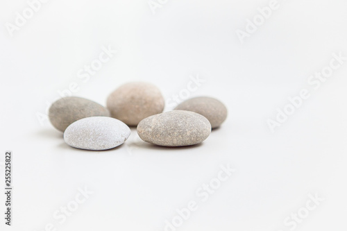 Pebbles on the white ground