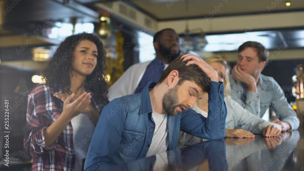Sport fans waving English flag, supporting national team, upset about defeat Sport fans waving English flag, supporting national team, upset about defeat