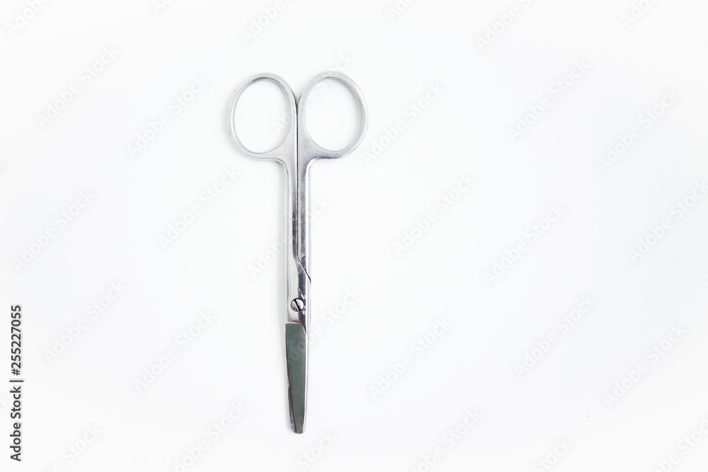 Scissors on the white ground Scissors on the white ground