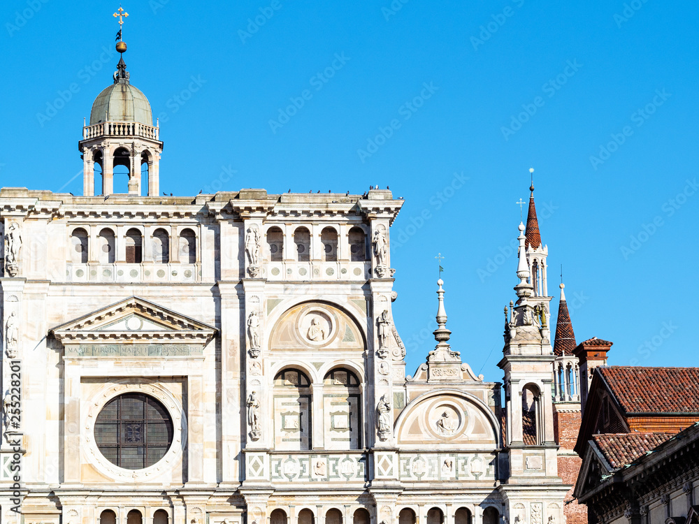 facade of church and towers of Certosa di Pavia