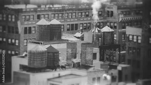 NYC Manhattan roof wooden water tanks smoke stack industrial vintage film look black white.mov