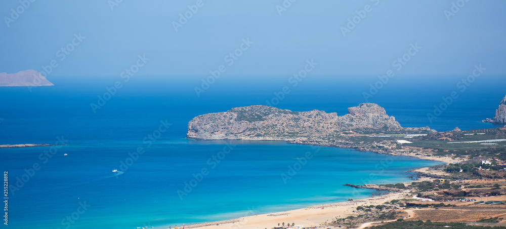 View on Falasarna beach, Crete Island landmark. Paradise beach with turquoise water and pink sand, Greece