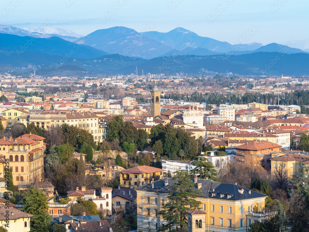 Alps mountain and Lower Town of Bergamo city