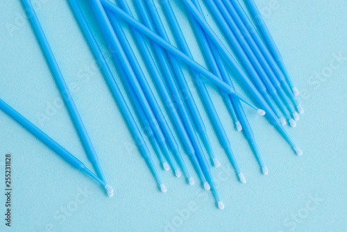Eyelash Extension Application Tools and Supplies. Disposable Microbrushes. Eyelash Cotton Swabs. Tools for Makeup and Cosmetic Procedures in beauty salon.