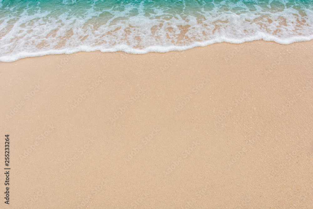 Soft wave of sea on empty sandy beach Background with copy space Soft wave of sea on empty sandy beach Background with copy space