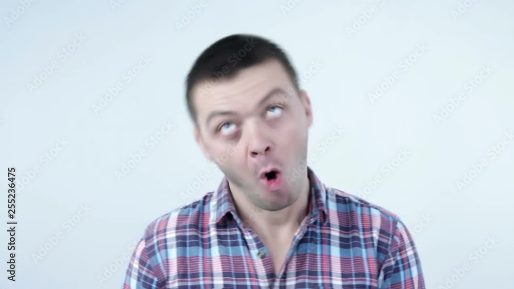 Young man with humorous funny face expressions Young man with humorous funny face expressions