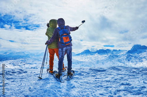 Happy selfie in winter Alps, Salzkammergut, Austria photo