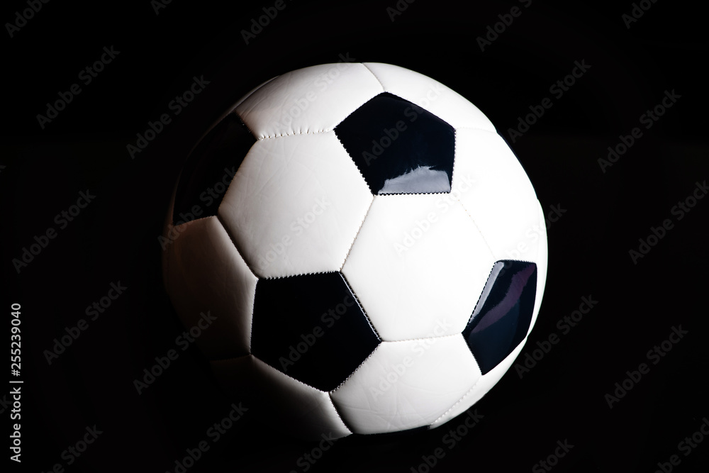 soccer ball isolated on black background.