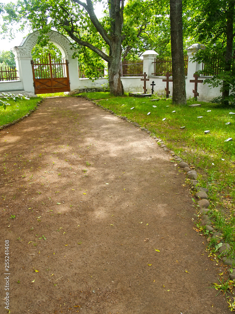 Path to gate at the old brotherly cemetery. Valaam Spaso-Preobrazhensky stavropegial monastery Path to gate at the old brotherly cemetery. Valaam Spaso-Preobrazhensky stavropegial monastery
