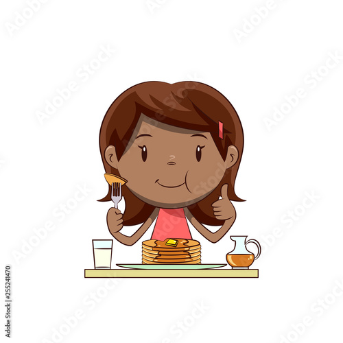 Little girl eating pancakes