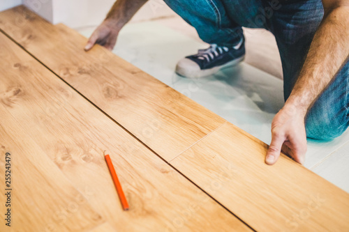 Flooring technology - laying of a floating laminate floor - eco-friendly finishing material