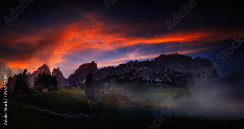 Panoramic view of famous Dolomites mountain peaks during evening light at sunset