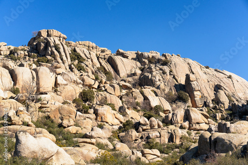 Panoramic view of granite rocks in La Pedriza, National Park of mountain range of Guadarrama in Manzanares El Real, Madrid, Spain. photo