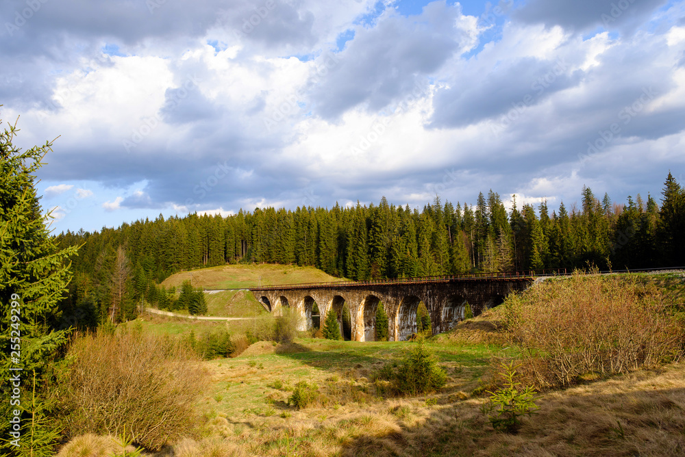 mountain landscape. with old viaduct bridge in Vorohta, Ukraine. Carpathian Mountains.