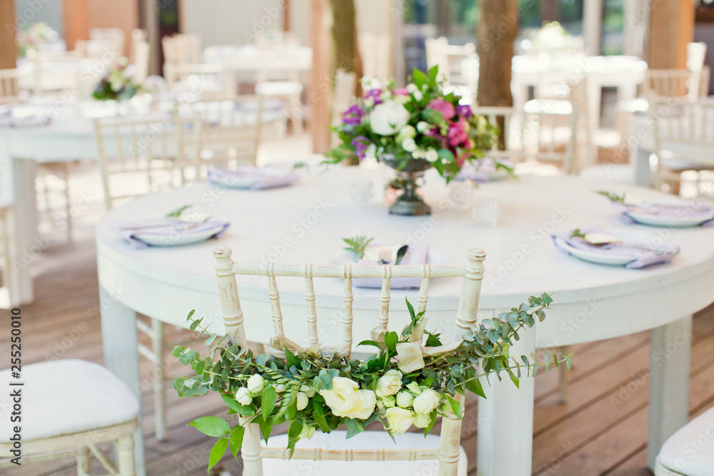 chairs with flowers and eucalyptus chairs with flowers and eucalyptus