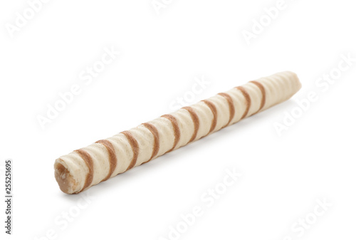Tasty wafer roll stick on white background. Crispy food