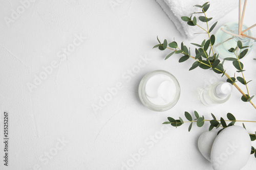 Flat lay composition with different body care products and space for text on ...