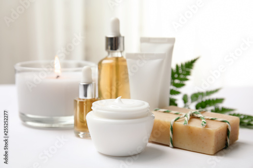 Composition with different body care products on table. Mockup for design