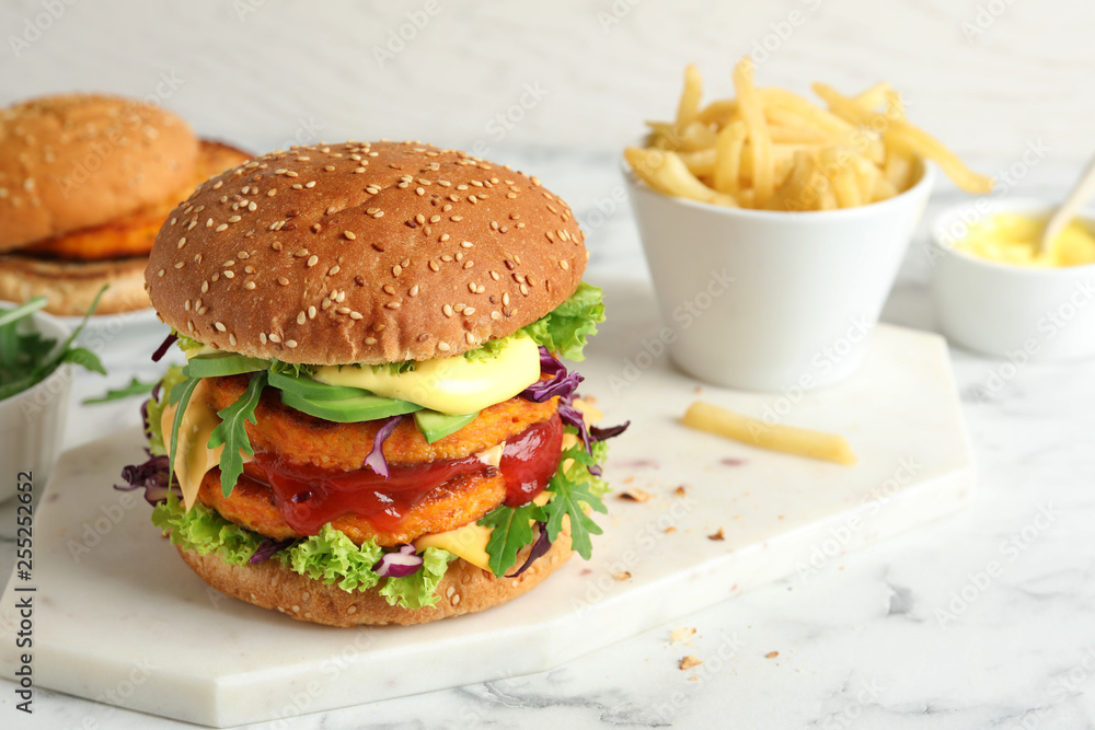 Vegan burger with carrot patties served on table. Space for text Vegan burger with carrot patties served on table. Space for text