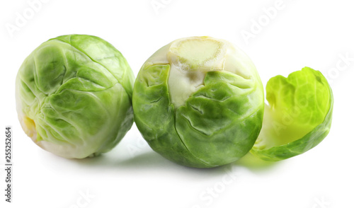 Fresh tasty Brussels sprouts on white background