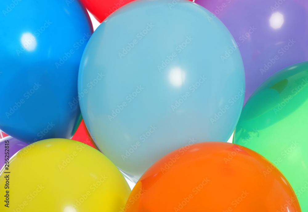 Group of bright festive balloons as background, closeup Group of bright festive balloons as background, closeup