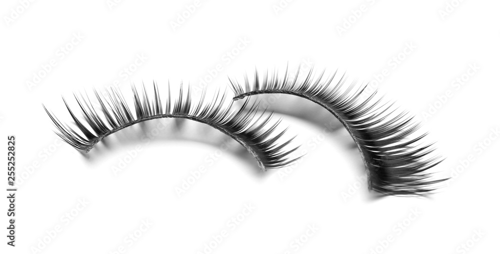 Beautiful pair of false eyelashes on white background Beautiful pair of false eyelashes on white background