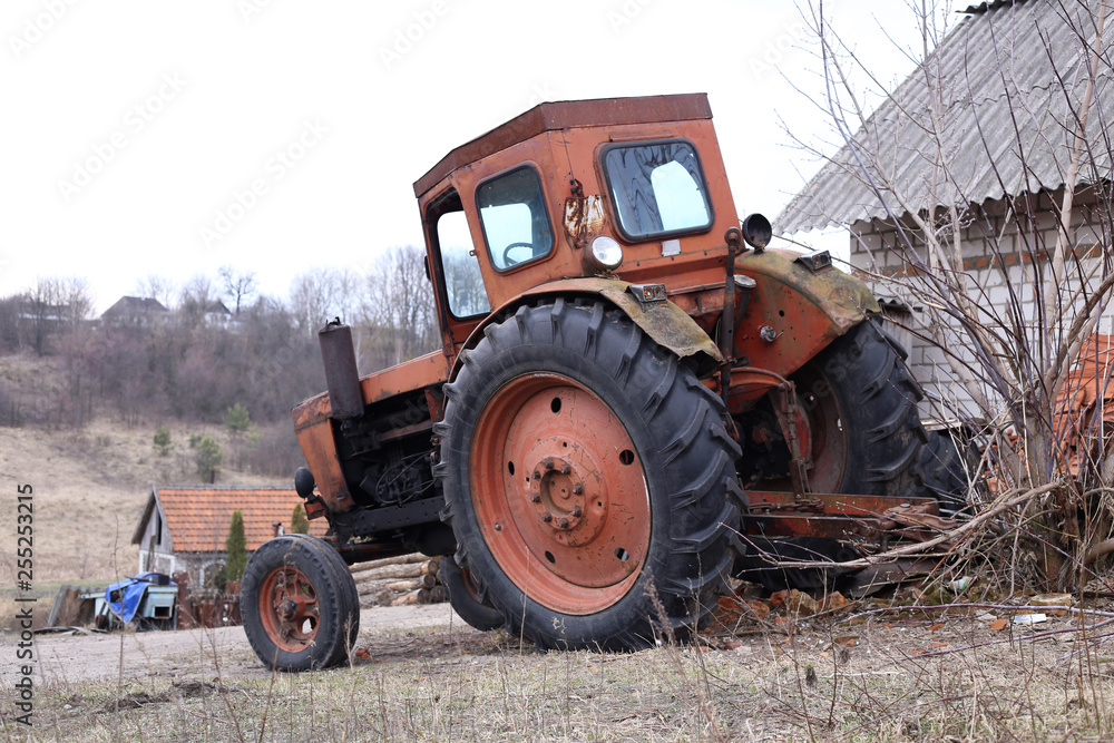 Old tractor for agricultural work. Old tractor for agricultural work.