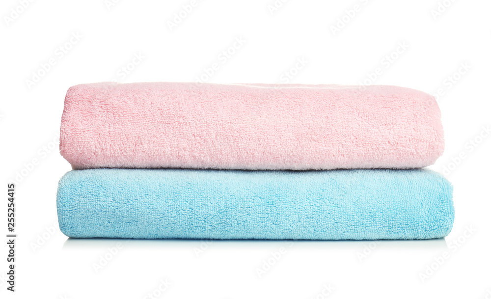 Folded soft terry towels on white background Folded soft terry towels on white background