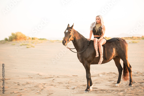 Arabian horse, a girl, and the desert
