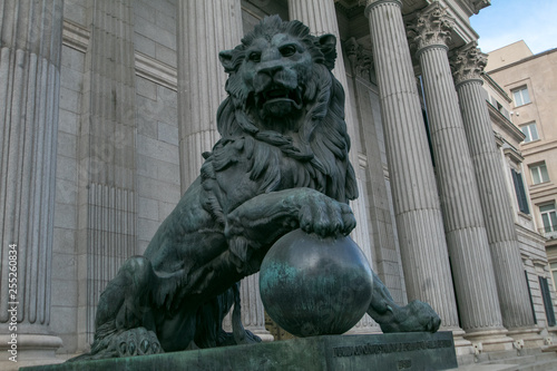 Main facade of the Spanish Parliament House with the lions on the entrance, Madrid, Spain)